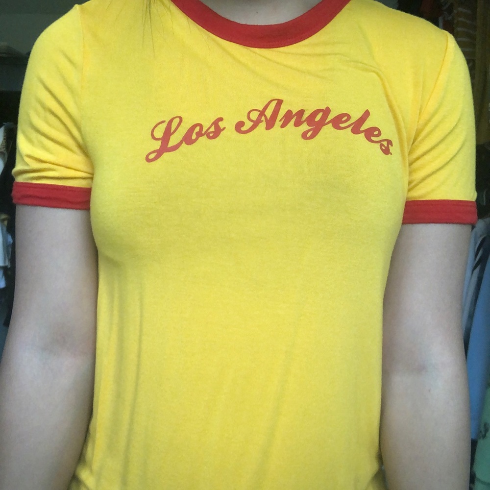A yellow Los Angeles top